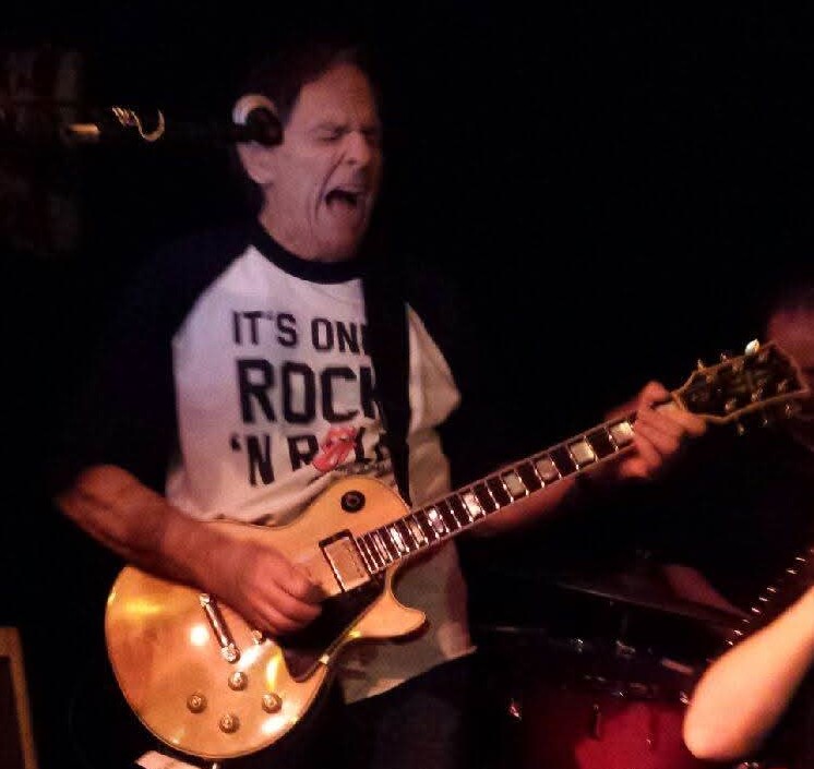 Randy playing guitar
